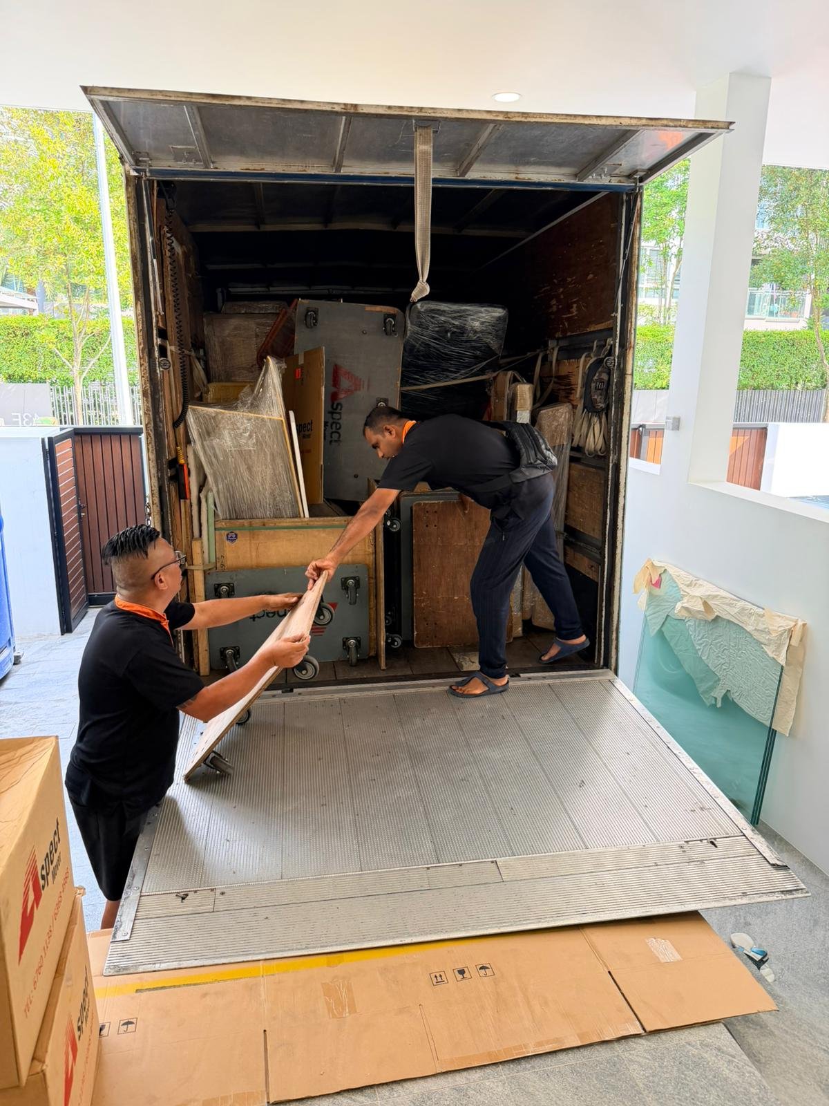 Aspect crew relocating office furniture and equipment in Singapore